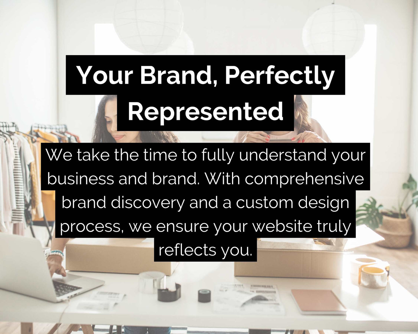 Two individuals are collaborating at a table equipped with laptops and boxes. A text overlay highlights the Advanced Website Design Package from Socially Inclined, emphasizing brand representation, the design process, and the critical role of SEO fundamentals in creating a mobile-friendly website.
