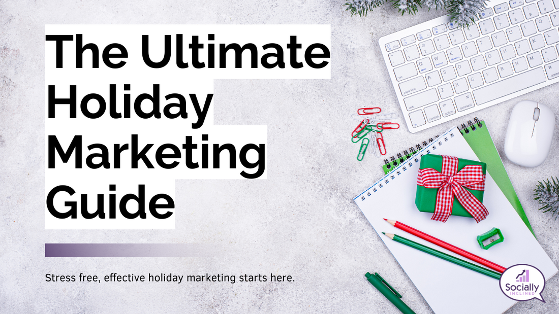 Graphic titled ‘The Ultimate Holiday Marketing Guide’ displayed over a flat-lay of holiday-themed office supplies, including a keyboard, wrapped gift, notebook, paperclips, and greenery on a white desk background.