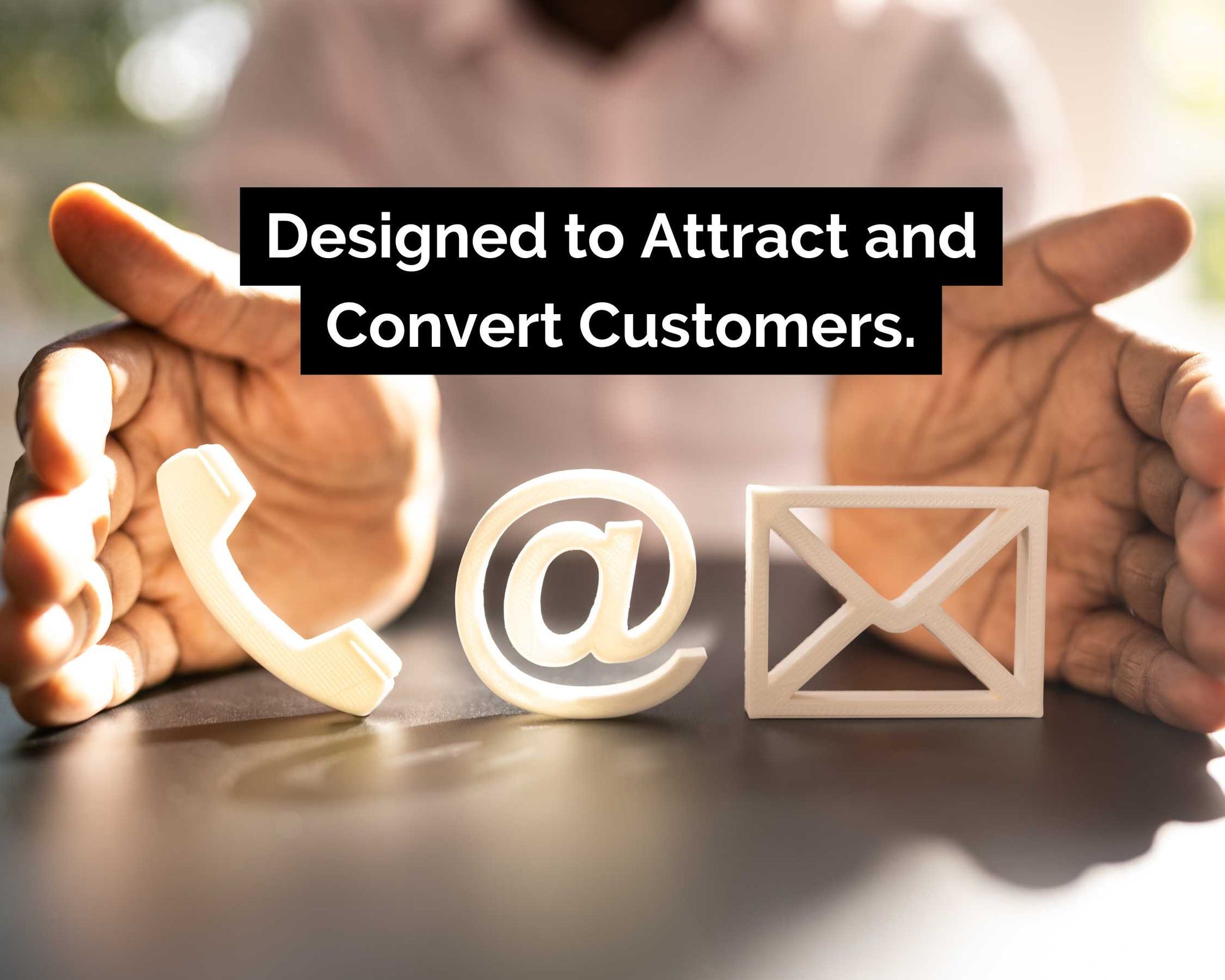 A person points to icons of a phone, at-sign, and envelope with the text "Designed to Attract and Convert Customers." The One-Day Website by Socially Inclined is an SEO-optimized solution that seamlessly incorporates social media integration, enhancing your small business website's reach.