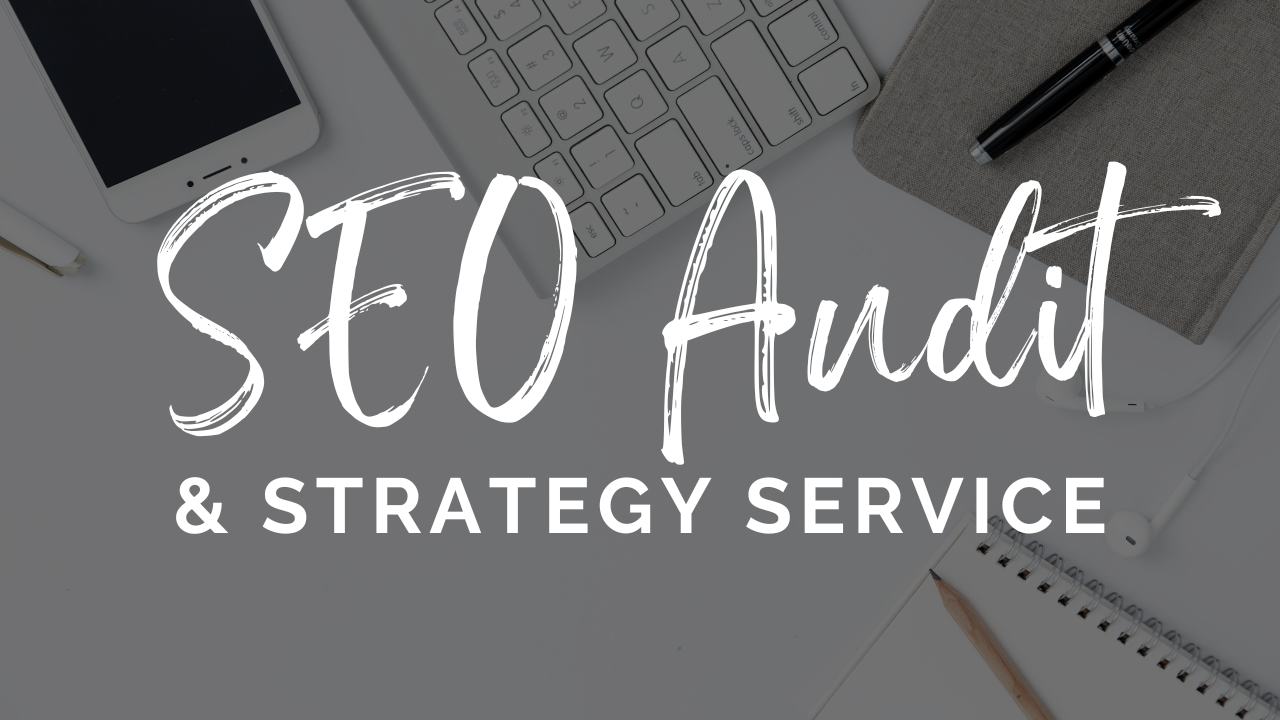 A graphic image displays "SEO Audit & Strategy Service" by Socially Inclined in cursive and block letters. A smartphone, keyboard, notebook, and pen are visible in the background, emphasizing tools essential for enhancing Search Engine Rankings.